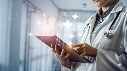 Doctor using tablet in a modern medical setting  