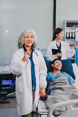 Obraz premium Nurse giving assistance to senior patient with disease in bed. Medical assistant and doctor doing healthcare checkup for pensioner with oxygen tube and IV drip bag in hospital ward.
