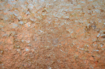 Texture of gold leaf creating a warm, shiny effect. This image captures the rich detail and glimmer of gold leaf