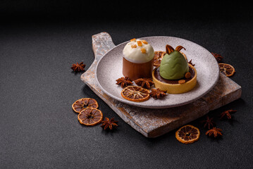 Easter sweet cake covered with icing with fruit and candied fruits