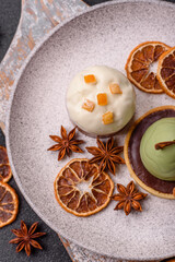 Easter sweet cake covered with icing with fruit and candied fruits