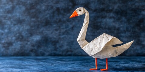 Fototapeta premium Origami Swan on Dark Blue Surface