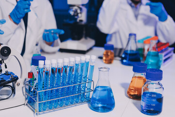 Fototapeta premium Chemists in a lab developing cosmetic products, testing and analyzing formulas for quality and effectiveness.