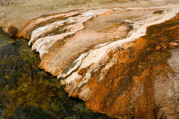Yellowstone National Park flowing water from geyser