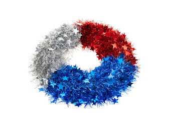Patriotic wreath with tinsel stars isolated on white for Independence Day or celebrate July 4th.