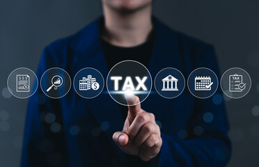 Tax Planning and Financial Compliance Concept. Businessperson points to tax icon on with finance,...