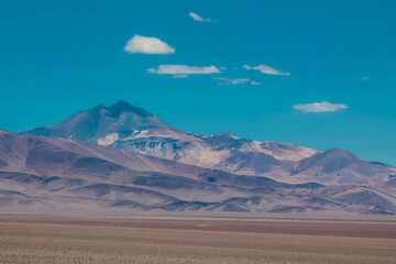 Atacama desert landscape in the Andes mountains of Chile in the Ojos del Salado area highest volcano on Earth. Dry arid desert soil and sand on the altiplano high altitude Andean palins South America