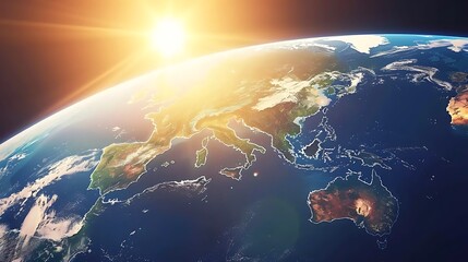 The earth from space with sunlight visible in the frame