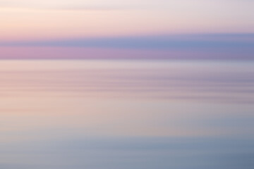 Blurred background sea and sky at sunrise.