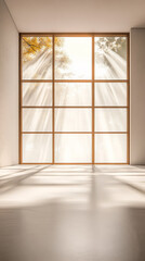 Natural light streaming through a large window in a modern interior space