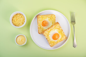 Sandwich with egg and cheese in a plate