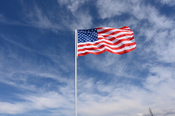 national flag of the USA fluttering in strong wind