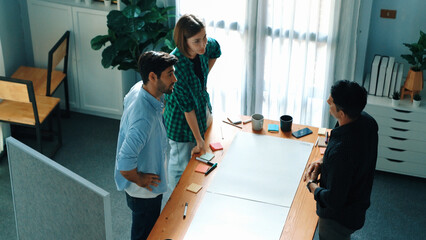 Top view of smart business team explain and discuss about plan at meeting table with sticky notes....