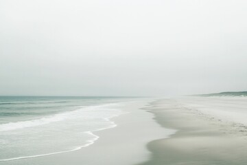 serene stretch of world-famous beach with soft waves and white sand captures minimalistic beauty