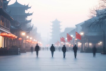 Obraz premium traditional chinese street scene with blurred figures walking bathed in soft ambient light