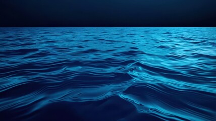 Obraz premium A dark blue ocean with a few waves