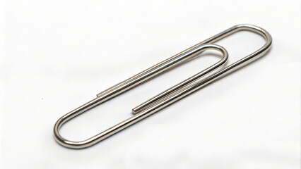 Metal paper clip on a clean white background  