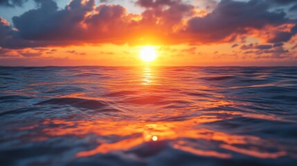 Fototapeta premium Fiery Sunset Over the Ocean: A Breathtaking View