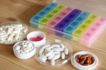Organizing pills for each day of the week using a pill organizer