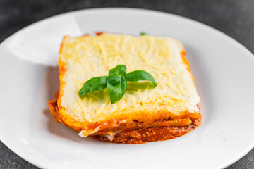 Lasagna vegetarian no meat bechamel, tomato sauce, vegetable dish vegetables organic product fresh tasty gourmet food background on the table rustic food top view copy space