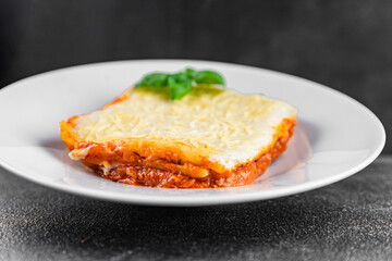 Lasagna vegetarian no meat bechamel, tomato sauce, vegetable dish vegetables organic product fresh tasty gourmet food background on the table rustic food top view copy space
