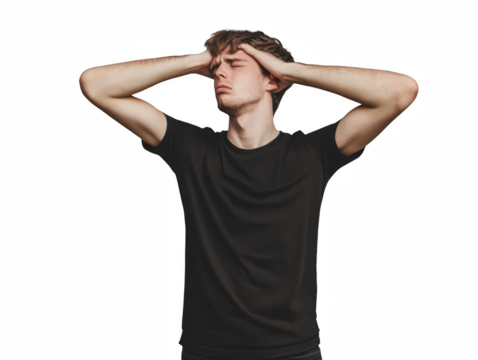 Young man expressing frustration gray background emotional portrait studio close-up perspective