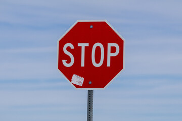 stop sign against blue sky
