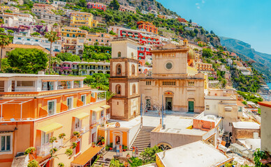 Positano coastline in south of Italy, vertiginous cliffs adorned with colorful villages, turquoise...