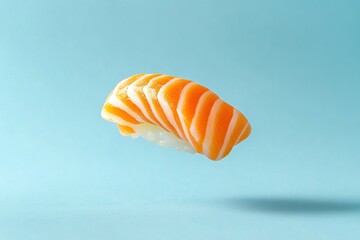 Fresh salmon sushi elegantly suspended against a serene blue backdrop, capturing culinary simplicity.
