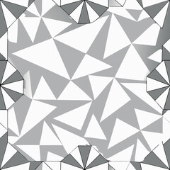 Abstract geometric pattern of gray and white triangles creating a modern design with angular shapes