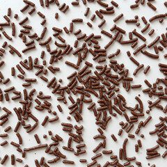 Chocolate sprinkles isolated on white background. Chocolate sprinkles on white background.