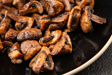 Mushroom fried champignon dish fresh gourmet food background on the table rustic food top view copy space vegetarian and vegan food