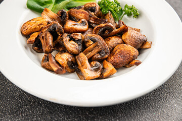 Mushroom fried champignon dish fresh gourmet food background on the table rustic food top view copy space vegetarian and vegan food