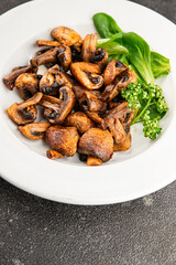 Mushroom fried champignon dish fresh gourmet food background on the table rustic food top view copy space vegetarian and vegan food