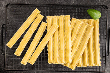 Pasta parpadelle stuffing mushrooms dish vegetables fresh delicious gourmet food background on...
