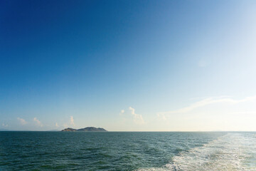 Serene Coastal Landscape with Vibrant Sky and Gentle Waves