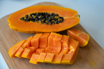 Ripe sweet tropical papaya fruits ready to eat, exotic food