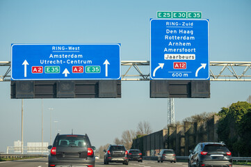 Road network infractrusture in Netherlands, driving safe on high quality asphalt on Dutch highways, A2, traffic jam problems, road construstion, many cars, rush hours