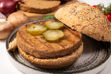 Make burger buns with vegan or vegetarian patties or burgers made from grains, vital wheat gluten food, grilled healthy food