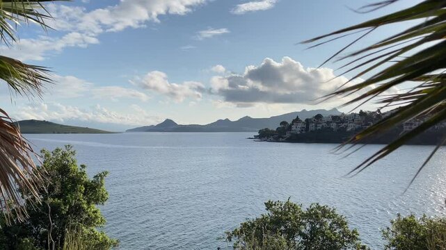 Blue sea, islands and boats on the Aegean coast. Summer vacation and coastal nature concept
