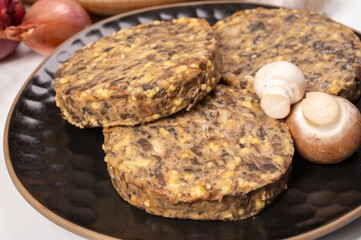 Tasty organic vegetarian food, burgers with champignons mushrooms, cheese and onion