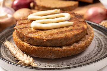Make burger buns with vegan or vegetarian patties or burgers made from grains, vital wheat gluten food, grilled healthy food