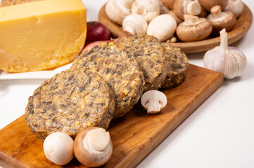 Tasty organic vegetarian food, burgers with champignons mushrooms, cheese and onion
