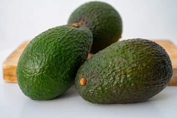 Green ripe avocado from organic avocado plantation - healthy food