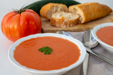 Famous vegetables soup from Cordoba, Andalusia salmorejo served cold in restaurant for lunch as starter dish close up