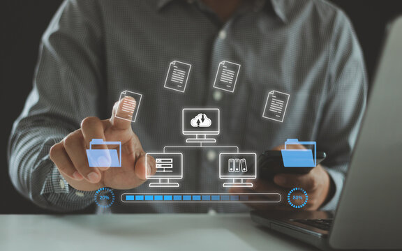 Transfer files data system relocation on cloud system technology concept. Business person hand using laptop computer waiting for transfer document file process with loading bar icon on virtual screen.