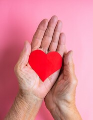 Obraz premium Heart in Hand – Symbol of Senior Love and Care