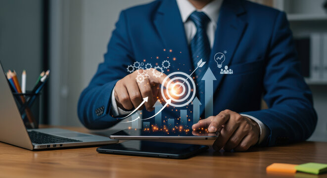 Achieving Goals: Business Strategy & Digital Growth. Man Tapping Target Icon on Tablet. Innovation, Success, and Teamwork in Action.