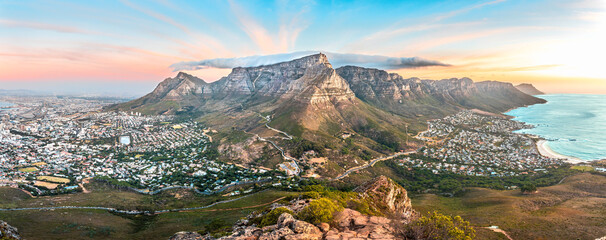 Cape Town, Stunning sunset with Table Mountain Landscape taken from the top of Lions Head - South Africa best travel destination for nature and adventure
