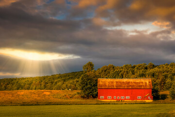 Red barn in Vermont under dramatic light